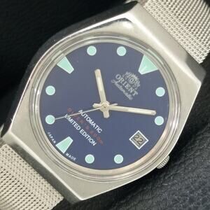 Vintage 1976 Orient Automatic Mens Silver Watch W/daydate & Green accents